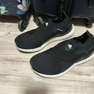 Size 6 1/2 slip on black ultra boost Adidas
